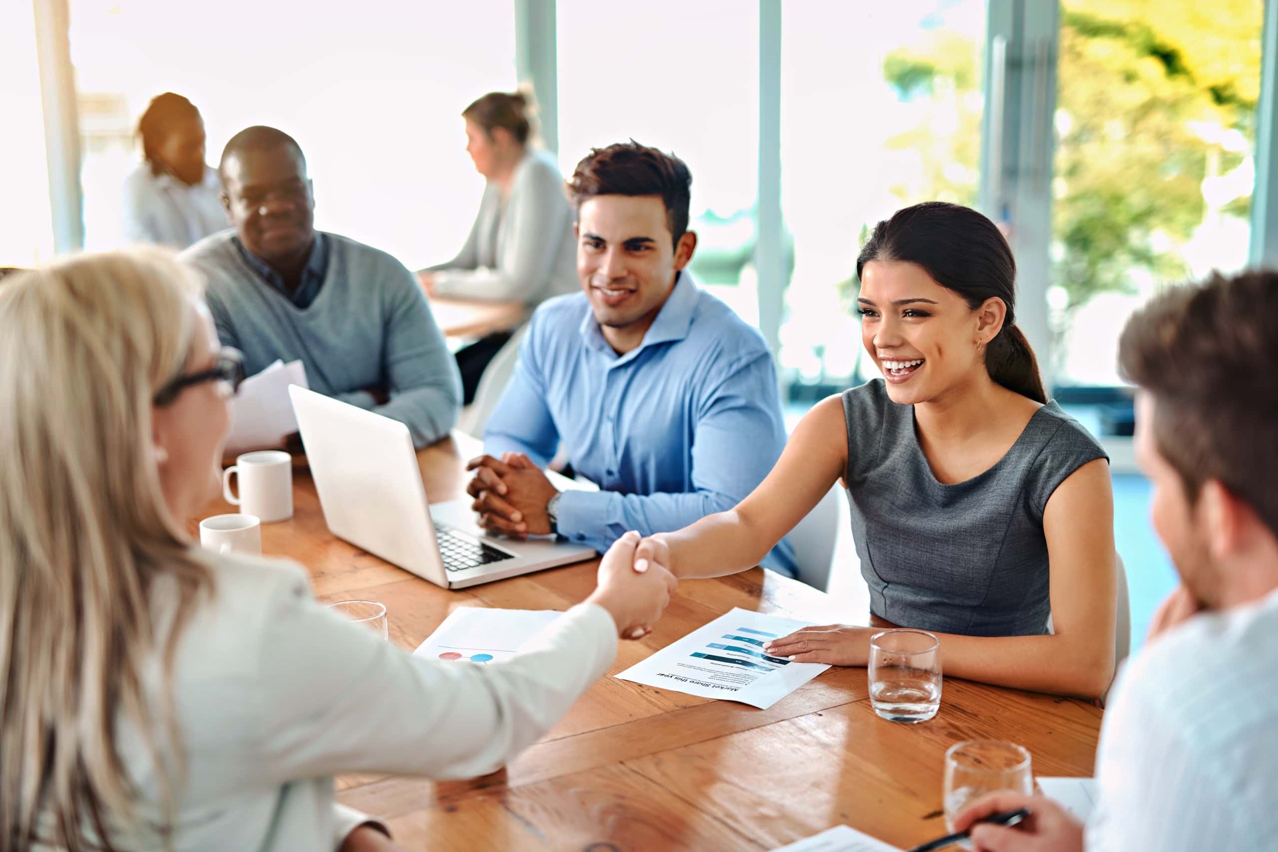 New employee being welcomed to the team, which is a key part of the onboarding process