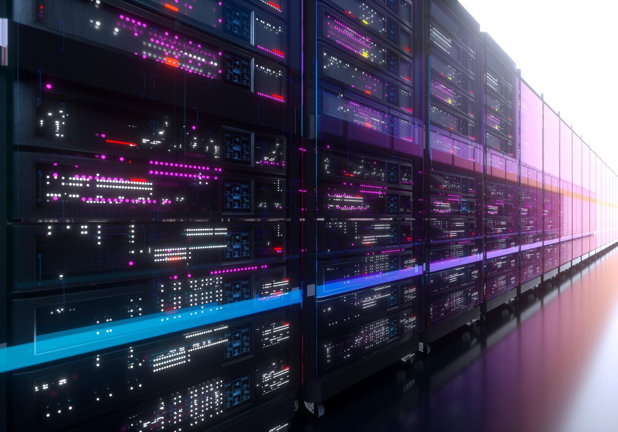 Rows of servers in a data center with glowing lights and digital displays, representing the scalable and secure cloud infrastructure (IaaS) solutions offered by Fast Fixx to build and manage IT infrastructure in the cloud