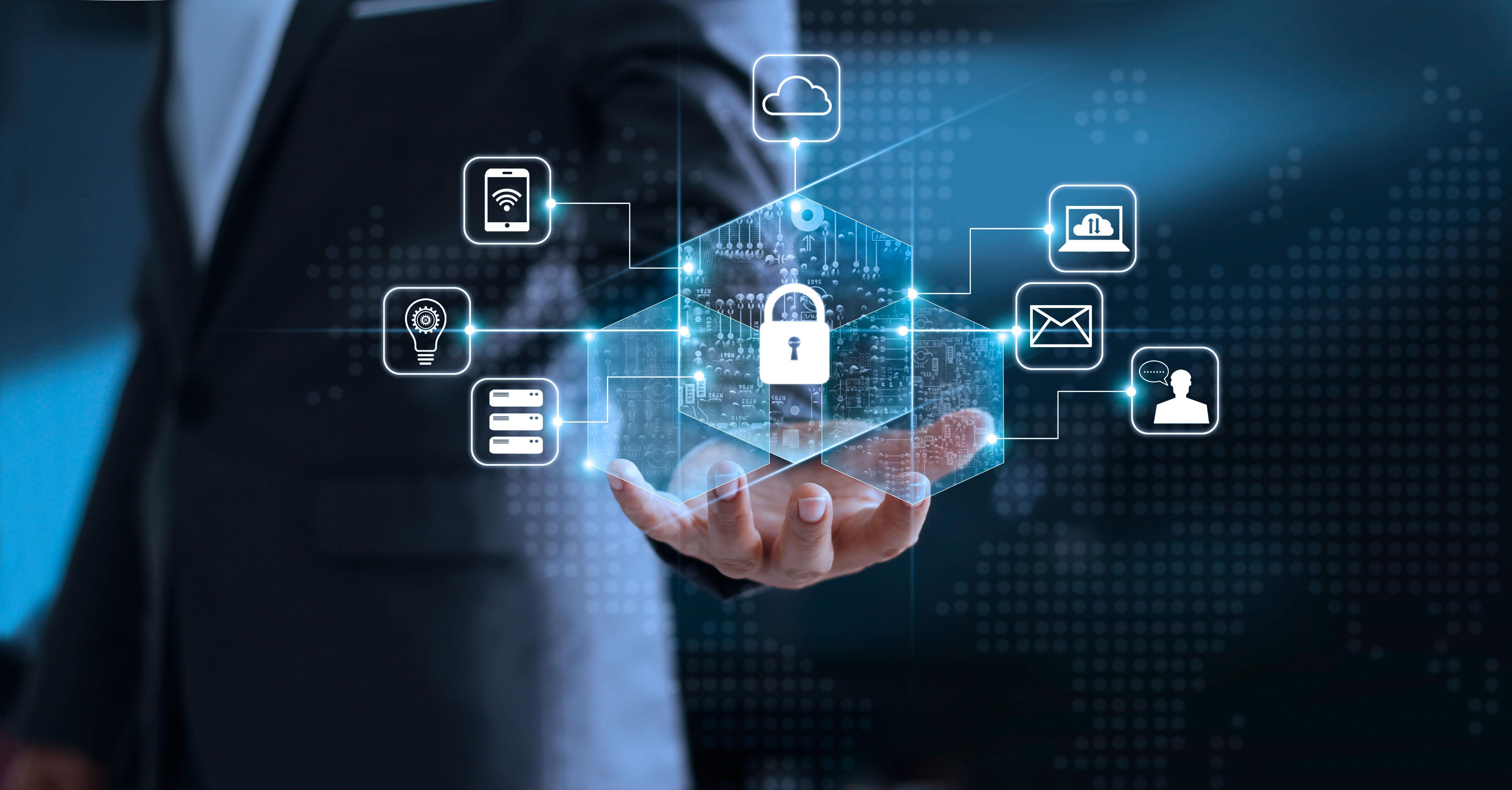 Businessman holding a digital padlock surrounded by icons representing data security and IT services, symbolizing the secure and cost-effective local backup solutions offered for enhanced data protection