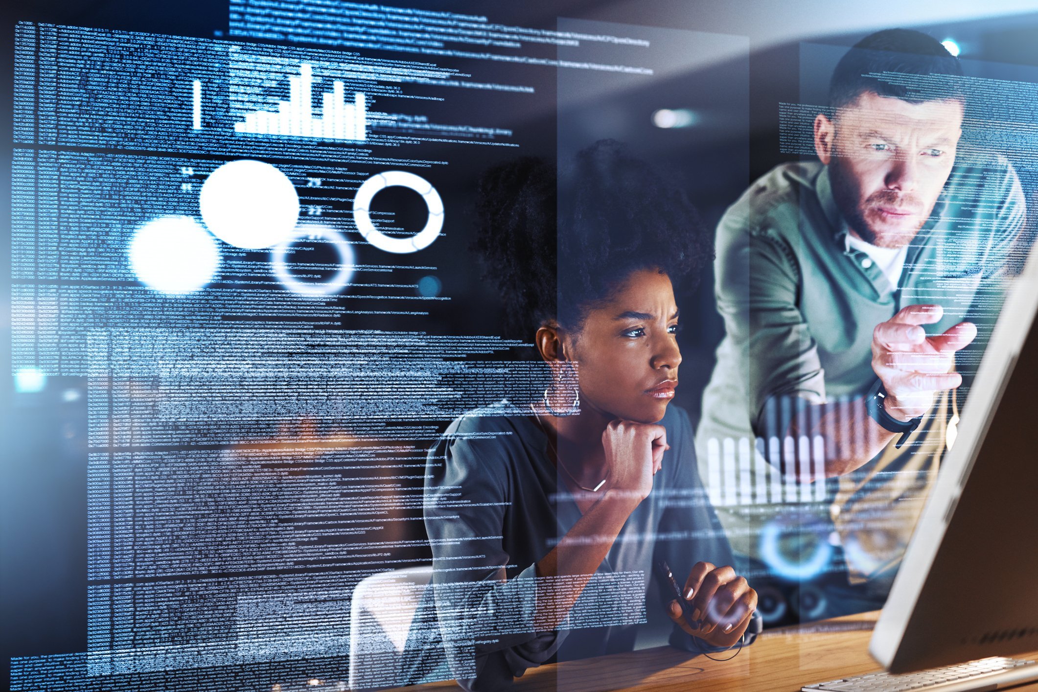 A team of IT professionals working together to monitor and manage a network, which is essential for ensuring optimal performance and uptime